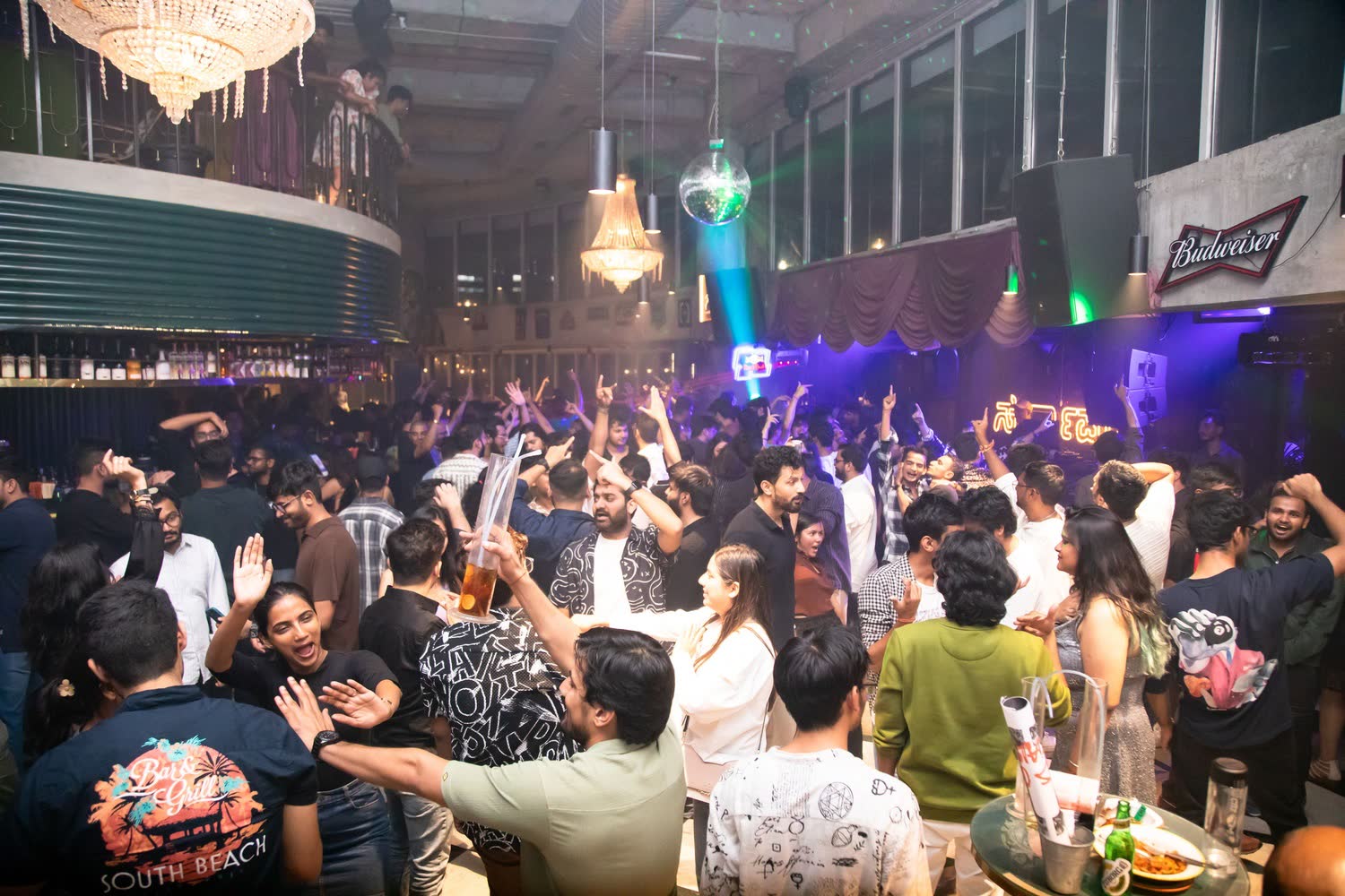 DJ VIC mixing at an international venue performance