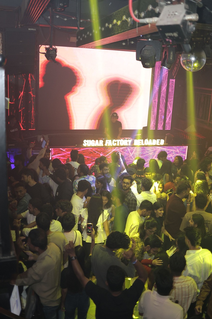 DJ VIC performing an audio-visual set at a corporate event